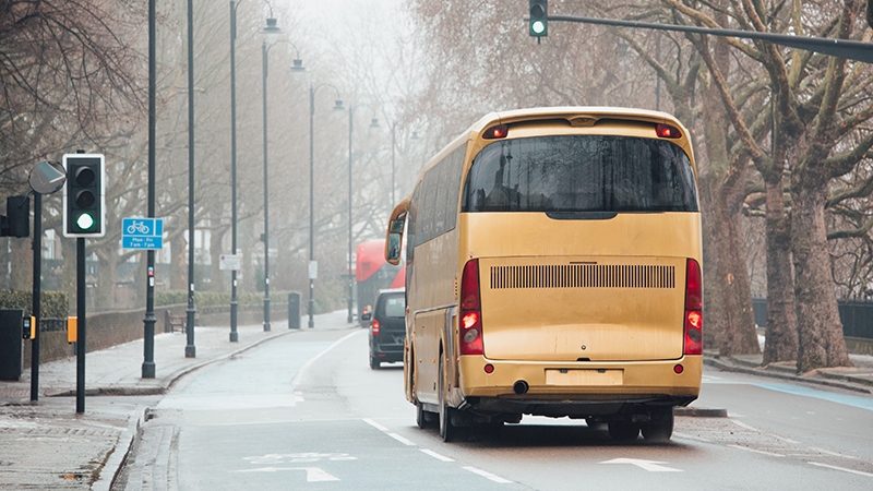Coach bus at city street